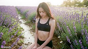Black haired East Asian girl in lavender field